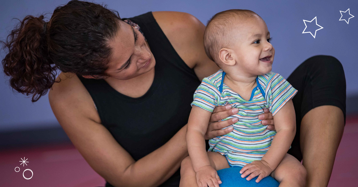 mom holding her infant son
