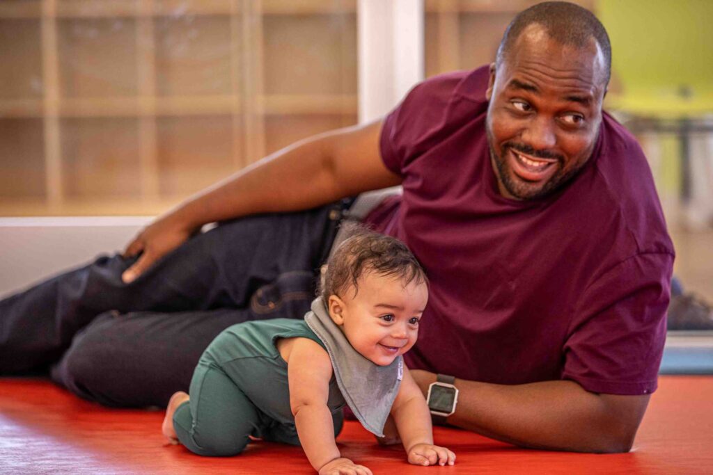 LittleGymBDay-675 father with his baby