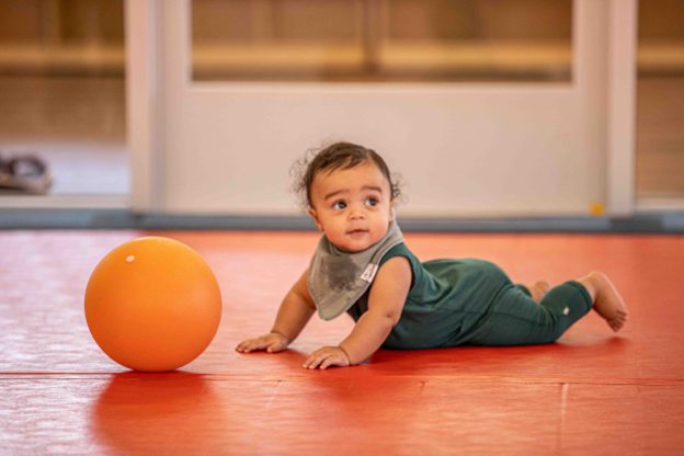 Baby Playing on Floor